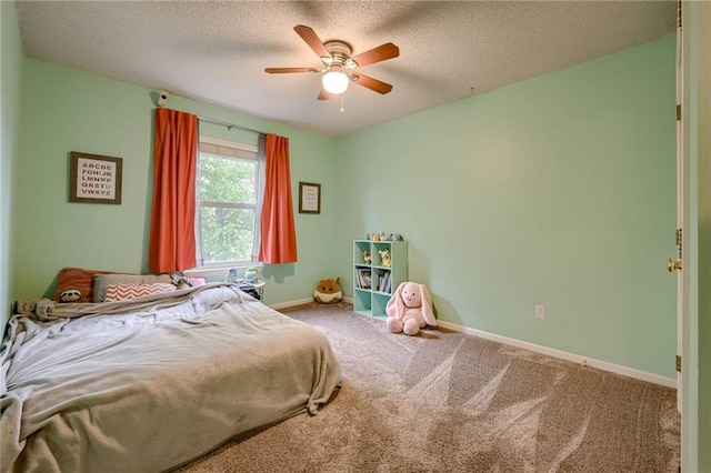 18716 W 164th Ter, Olathe, KS 66062 - carpeted bedroom featuring baseboards, a textured ceiling, and a ceiling fan