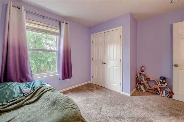 18716 W 164th Ter, Olathe, KS 66062 - carpeted bedroom with baseboards and a closet