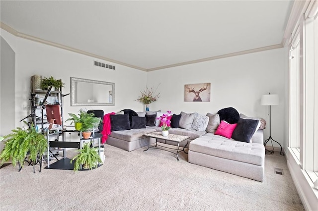 living room with carpet floors, ornamental molding, and arched walkways