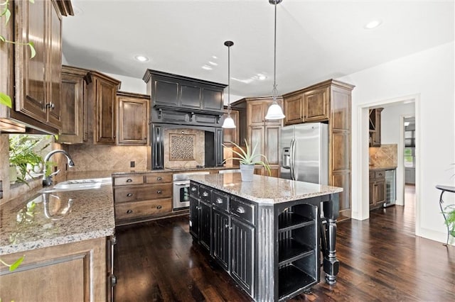 kitchen featuring stainless steel appliances, dark wood finished floors, open shelves, light stone counters, and recessed lighting