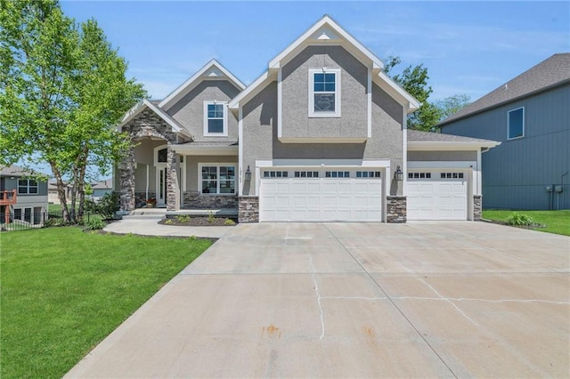 12765 N Imperial Dr, Platte City, MO 64079 - craftsman house featuring driveway, stone siding, a front yard, and stucco siding