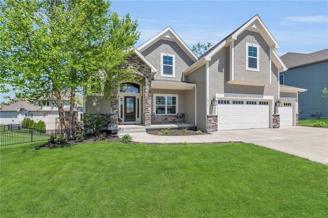 12765 N Imperial Dr, Platte City, MO 64079 - view of front of house featuring stone siding, a garage, stucco siding, and driveway