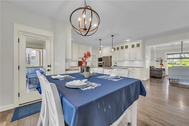 12765 N Imperial Dr, Platte City, MO 64079 - dining area featuring a chandelier, wood finished floors, baseboards, and recessed lighting