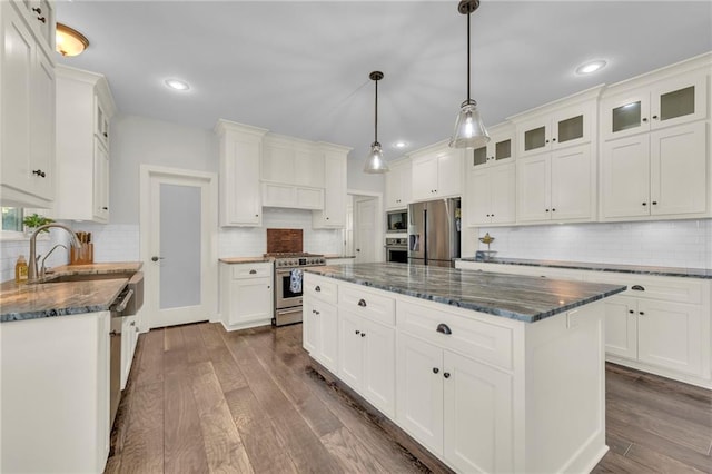 12765 N Imperial Dr, Platte City, MO 64079 - kitchen with stainless steel appliances, backsplash, dark wood-style floors, and recessed lighting