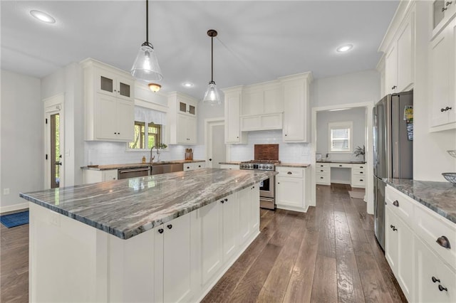 12765 N Imperial Dr, Platte City, MO 64079 - kitchen featuring stainless steel appliances, white cabinetry, recessed lighting, dark wood-style floors, and a sink
