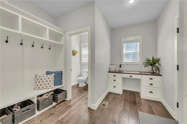12765 N Imperial Dr, Platte City, MO 64079 - mudroom featuring dark wood-style floors and baseboards
