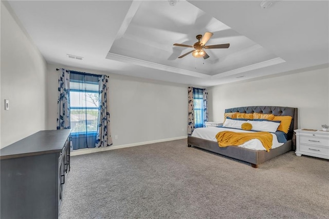 12765 N Imperial Dr, Platte City, MO 64079 - carpeted bedroom featuring a raised ceiling, a ceiling fan, baseboards, and ornamental molding