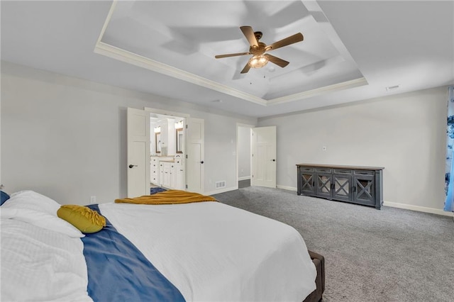 12765 N Imperial Dr, Platte City, MO 64079 - carpeted bedroom with a raised ceiling, ornamental molding, baseboards, ceiling fan, and ensuite bath