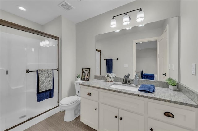 12765 N Imperial Dr, Platte City, MO 64079 - full bath featuring a stall shower, vanity, and toilet