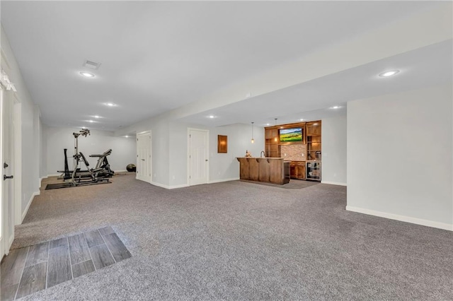 12765 N Imperial Dr, Platte City, MO 64079 - workout area with baseboards, bar, recessed lighting, and carpet
