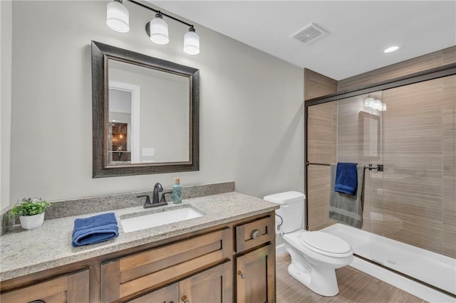 12765 N Imperial Dr, Platte City, MO 64079 - bathroom with a shower stall, toilet, and vanity