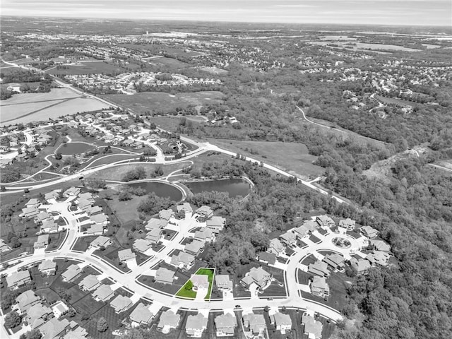 12765 N Imperial Dr, Platte City, MO 64079 - aerial view of residential area with a large body of water