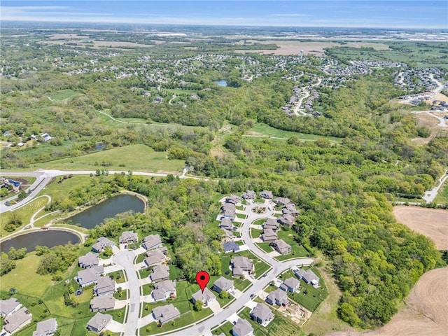 12765 N Imperial Dr, Platte City, MO 64079 - aerial view of property and surrounding area featuring a large body of water and nearby suburban area