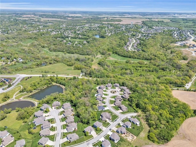 12765 N Imperial Dr, Platte City, MO 64079 - aerial view of property and surrounding area featuring a nearby body of water and nearby suburban area