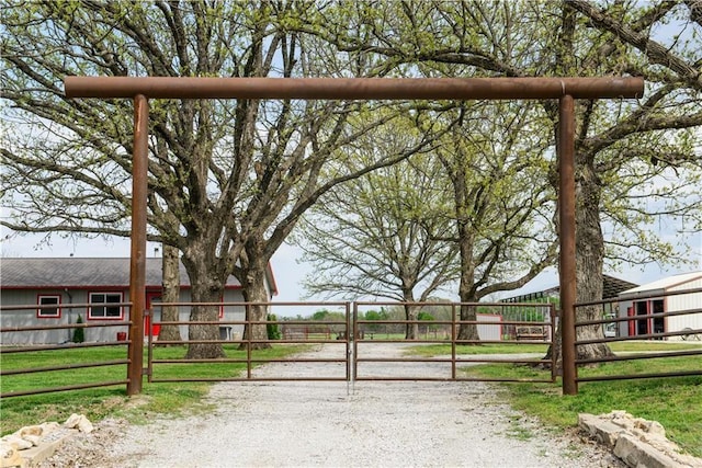 6721 Read Rd, Pleasanton, KS 66075 - view of dirt / gravel driveway with a gated entry and a gate