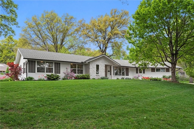 9818 Overbrook Ct, Leawood, KS 66206 - ranch-style home with stone siding and a front yard