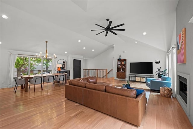 9818 Overbrook Ct, Leawood, KS 66206 - living room with recessed lighting, light wood-style flooring, and lofted ceiling