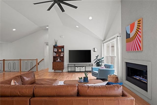 9818 Overbrook Ct, Leawood, KS 66206 - living room featuring recessed lighting, a ceiling fan, vaulted ceiling, and light wood finished floors