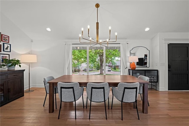 9818 Overbrook Ct, Leawood, KS 66206 - dining room featuring an inviting chandelier, baseboards, recessed lighting, and light wood-style flooring