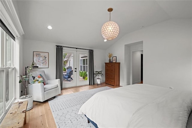 9818 Overbrook Ct, Leawood, KS 66206 - bedroom featuring french doors, access to outside, light wood-style flooring, and vaulted ceiling