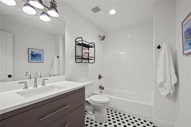 9818 Overbrook Ct, Leawood, KS 66206 - bathroom featuring visible vents, tile patterned flooring, vanity, toilet, and bathing tub / shower combination