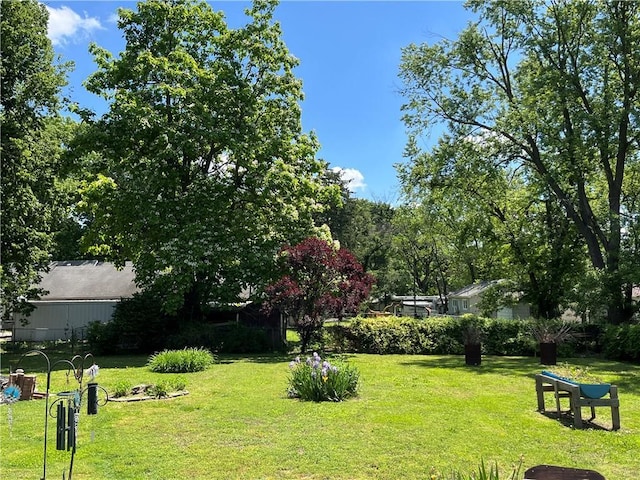 1610 N Main St, Nevada, MO 64772 - view of home's community featuring a lawn