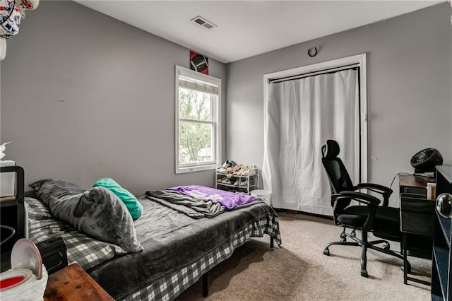 516 Parker St, Osawatomie, KS 66064 - carpeted bedroom with a desk