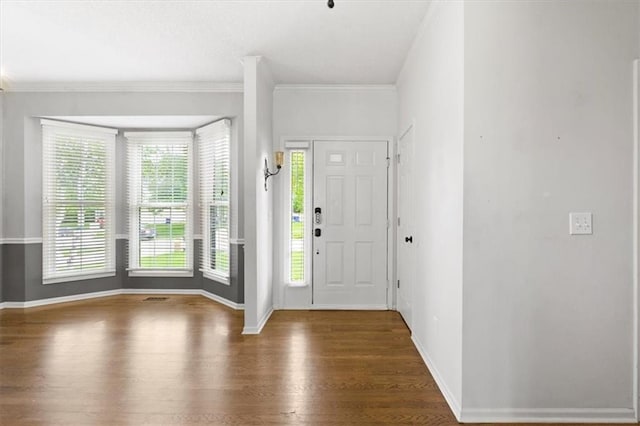 14175 W 149th Ter, Olathe, KS 66062 - foyer featuring wood finished floors, ornamental molding, and baseboards