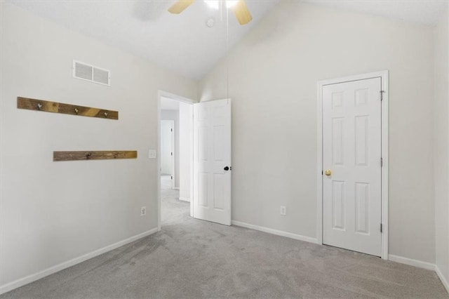 14175 W 149th Ter, Olathe, KS 66062 - unfurnished bedroom featuring carpet flooring, lofted ceiling, baseboards, and a ceiling fan