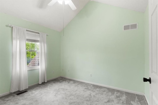 14175 W 149th Ter, Olathe, KS 66062 - spare room featuring light carpet, vaulted ceiling, a ceiling fan, and baseboards