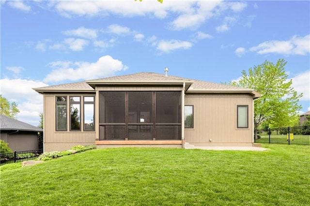 back of house with a sunroom