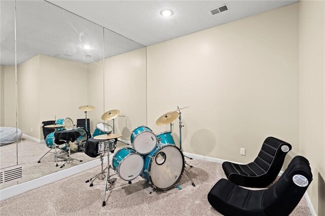 rec room featuring carpet flooring, recessed lighting, baseboards, and visible vents