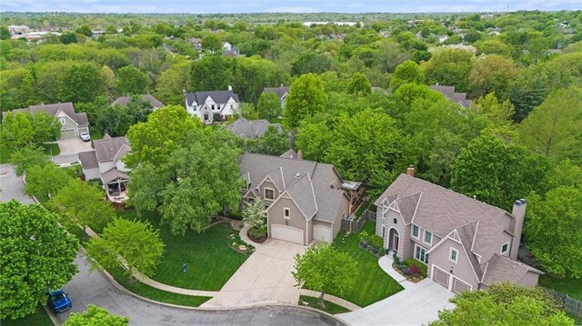 birds eye view of property with a residential view