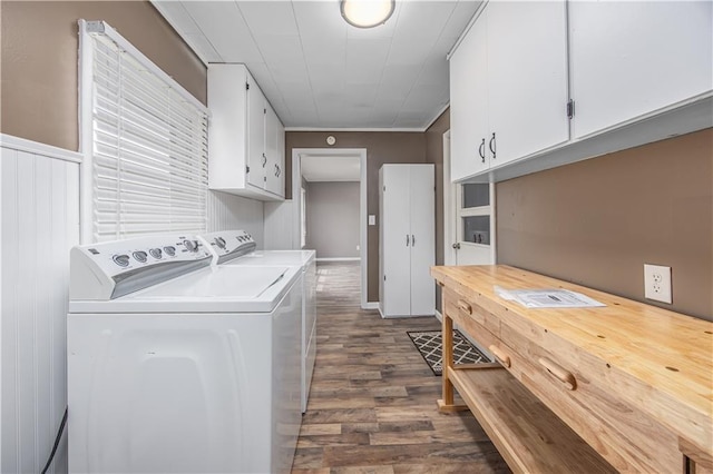 306 S 5th St, Neodesha, KS 66757 - clothes washing area featuring dark wood-style flooring, washer and dryer, and cabinet space