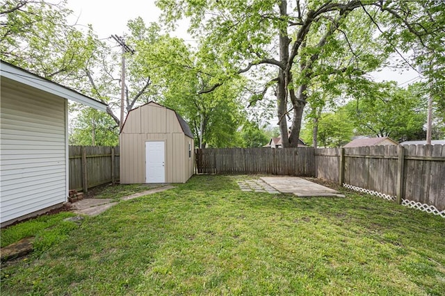 306 S 5th St, Neodesha, KS 66757 - view of yard with an outbuilding, a shed, a fenced backyard, and a patio area