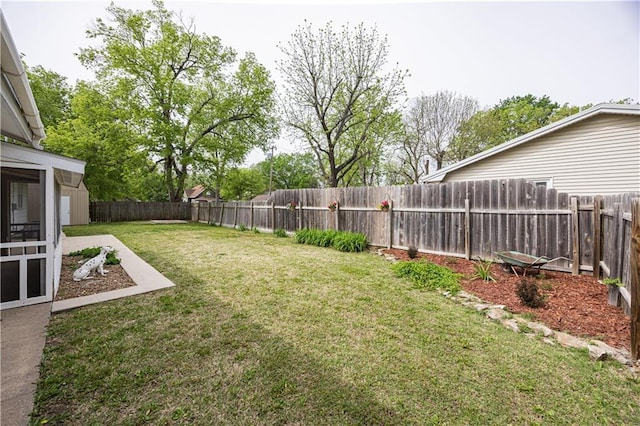 306 S 5th St, Neodesha, KS 66757 - view of yard with a fenced backyard
