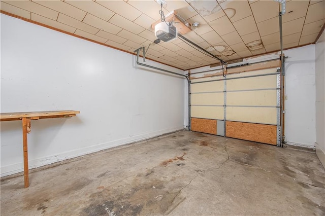 306 S 5th St, Neodesha, KS 66757 - garage featuring a garage door opener