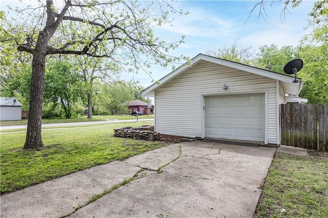 306 S 5th St, Neodesha, KS 66757 - detached garage with fence and concrete driveway