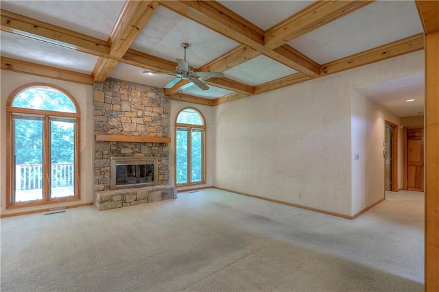 12341 Beverly St, Leawood, KS 66209 - unfurnished living room with carpet flooring, ceiling fan, beam ceiling, coffered ceiling, and a fireplace