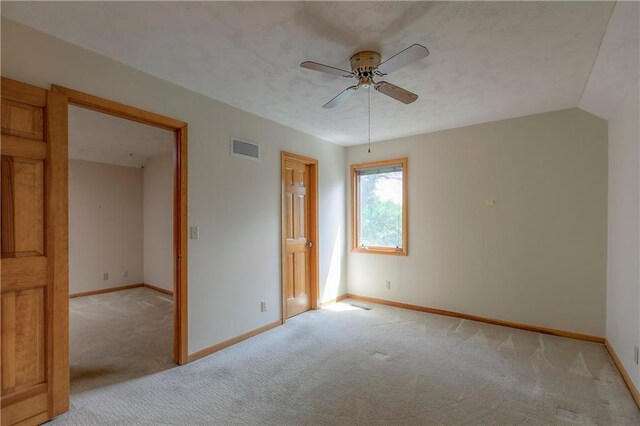 12341 Beverly St, Leawood, KS 66209 - unfurnished bedroom featuring light colored carpet, baseboards, and ceiling fan