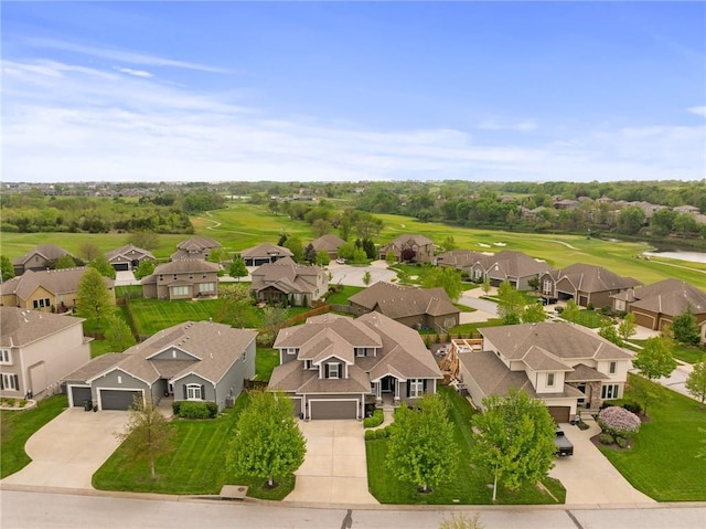 bird's eye view with a residential view and golf course view