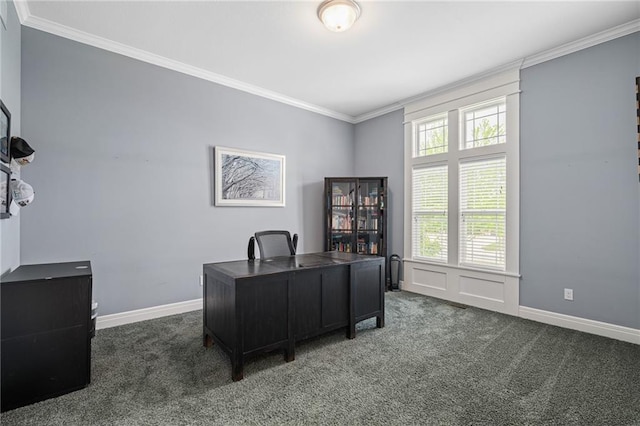 office area featuring crown molding, baseboards, and dark carpet