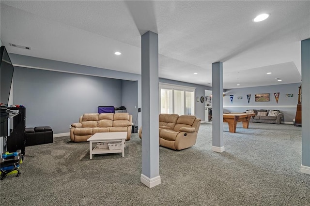 living room featuring carpet flooring, a textured ceiling, recessed lighting, baseboards, and visible vents