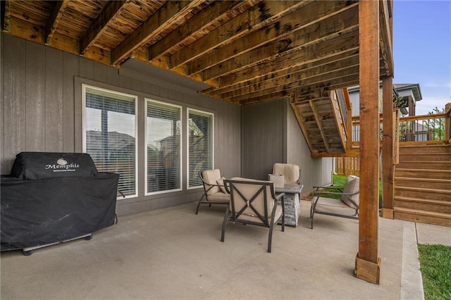 view of patio featuring stairs and area for grilling