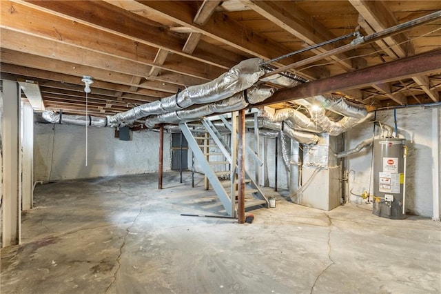 unfinished basement with water heater, heating unit, and stairway