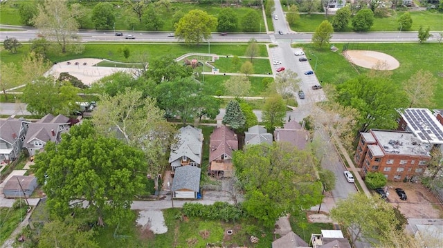 birds eye view of property with a residential view