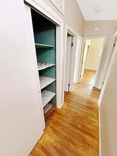 hall with light wood-style flooring