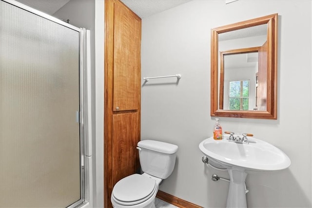 22716 E 29th Street Lane Ct S, Blue Springs, MO 64015 - bathroom with a stall shower, toilet, and baseboards