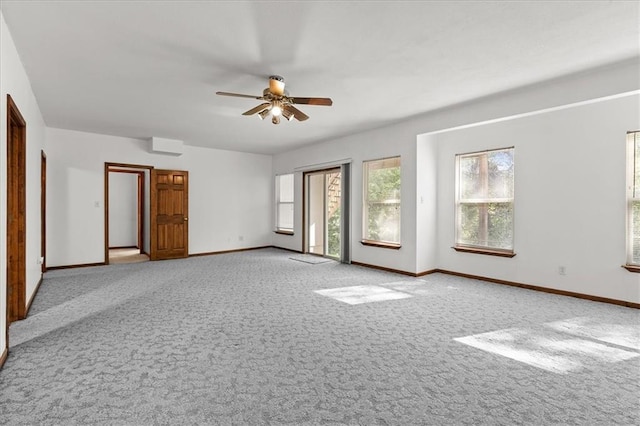 22716 E 29th Street Lane Ct S, Blue Springs, MO 64015 - spare room featuring carpet, ceiling fan, and baseboards