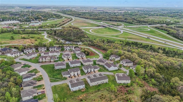 birds eye view of property with a residential view